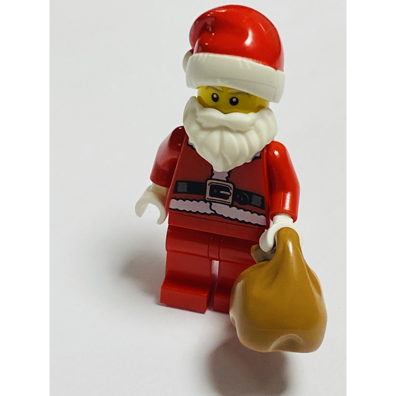 Kerstman met kado zak